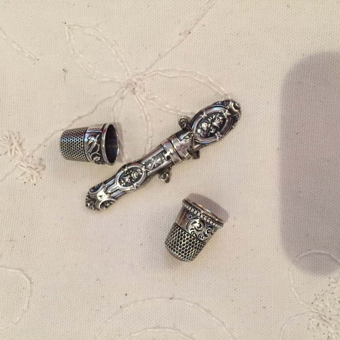 Some of my buys - two beautiful antique sterling silver thimbles and a needle case